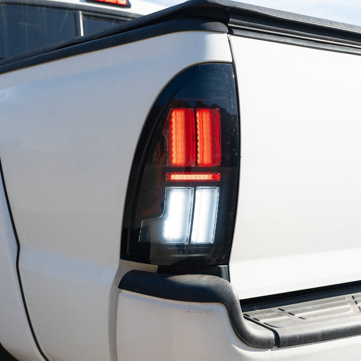 05-15 Toyota Tacoma NOVA-Series Prismatic LED Tail Lights Black | AlphaRex