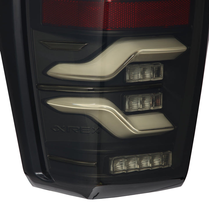 16-23 Toyota Tacoma LUXX-Series LED Tail Lights Black | AlphaRex