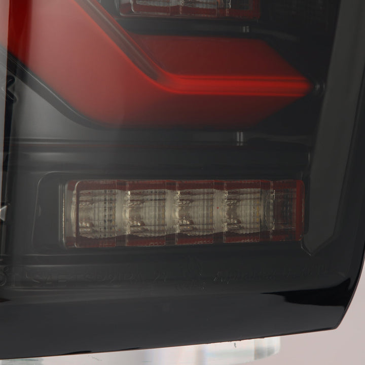 16-23 Toyota Tacoma LUXX-Series LED Tail Lights Black-Red | AlphaRex