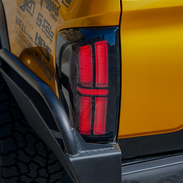 16-23 Toyota Tacoma NOVA-Series Prismatic LED Tail Lights Black | AlphaRex